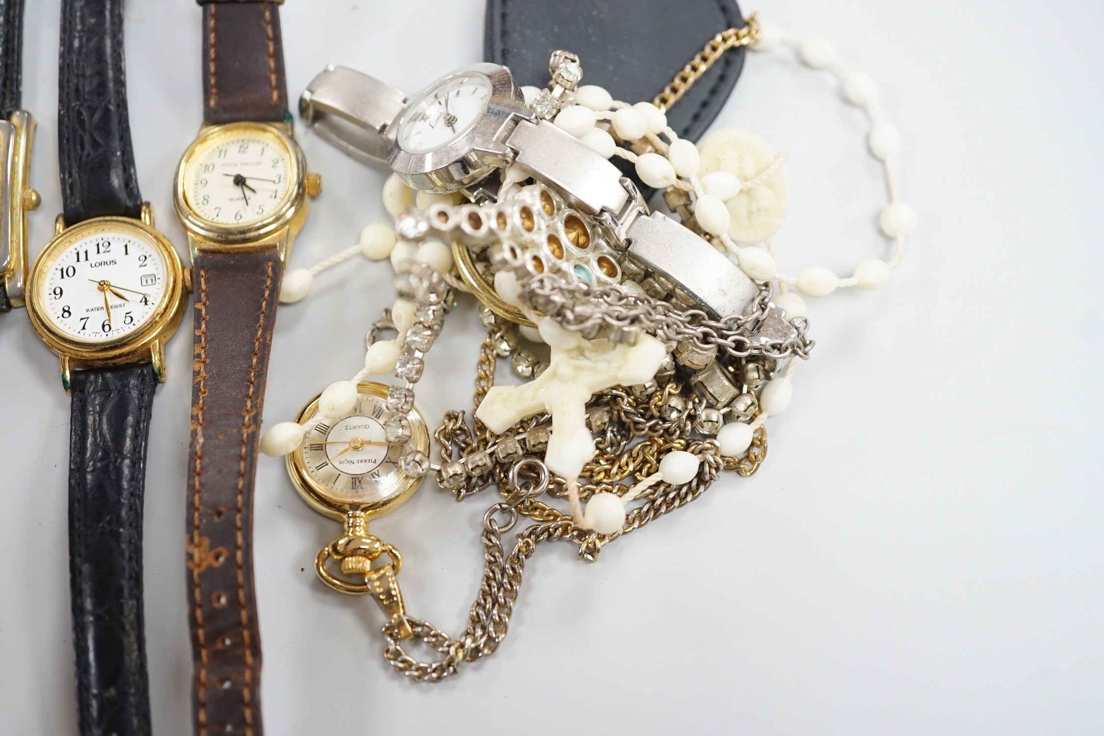 A small quantity of assorted costume jewellery and wrist watches.